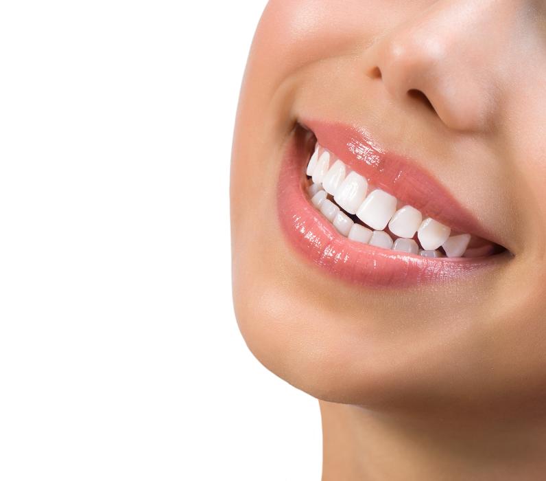 A photo of a smiling client after teeth whitening in Pacifica, CA