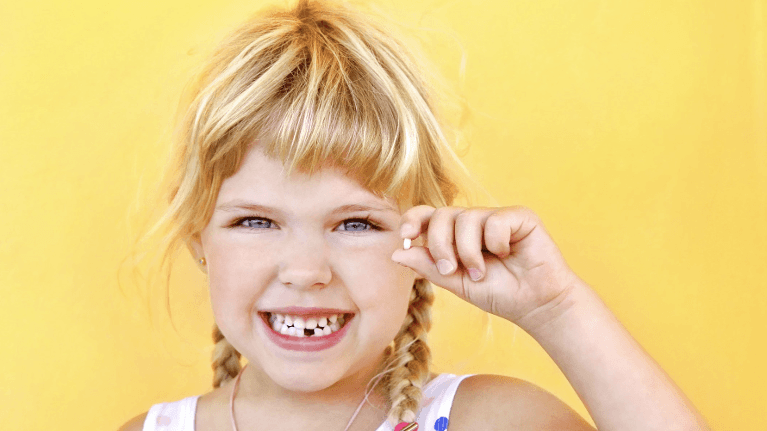 A little girl at Cabrillo Family dental care a tooth extraction by Dr Sarah Esmaili