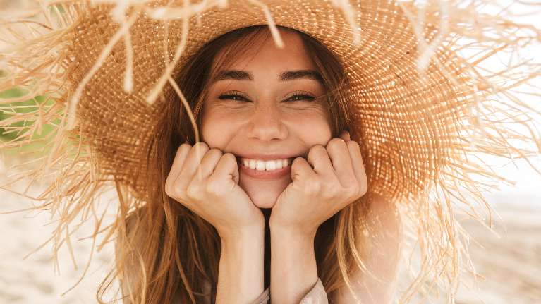 A Lady smiling after getting veneers at Cabrillo Family Dental Care, Pacifica, CA
