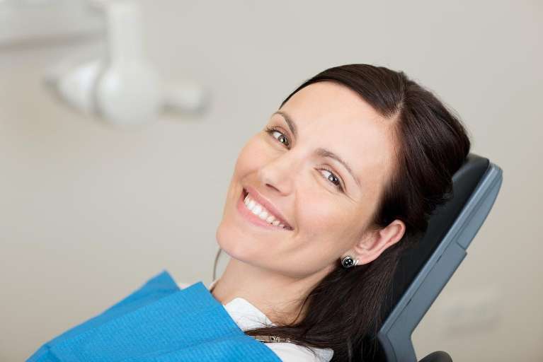 A patient after getting Teeth Whitening in Pacifica, CA