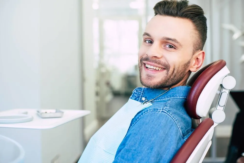 Patient sitting in a dental chair
