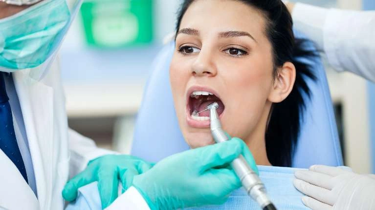 Dentist treating a patient