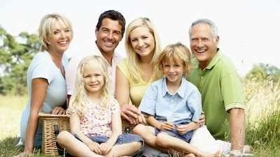 Multi generational family posing for a photo