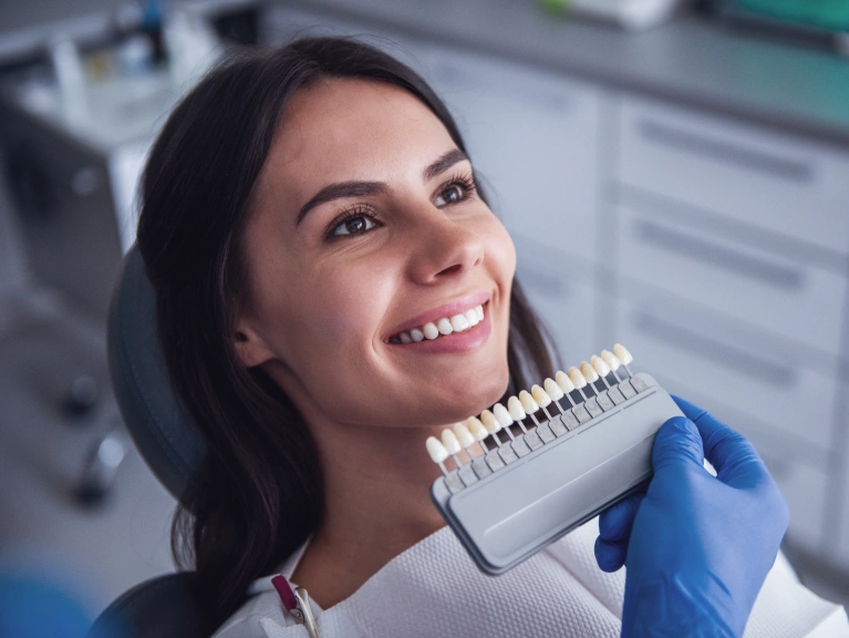 A patient smiling while treatment is going