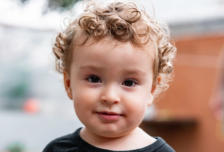 A child smiling at the camera
