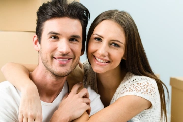 A young couple posing for a photo