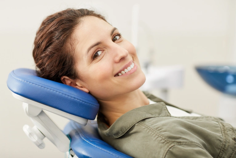 A woman lying in a dental chair